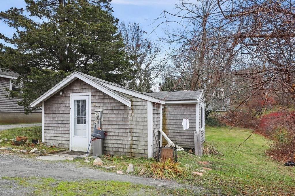2705 State Highway Eastham, MA 02642 - Photo 34 of 42 a view of a house with yard and a tree