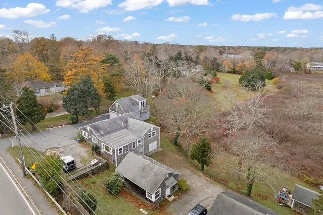 an aerial view of a house with mountain view