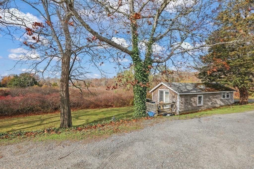 2705 State Highway Eastham, MA 02642 - Photo 42 of 42 front view of house with a yard