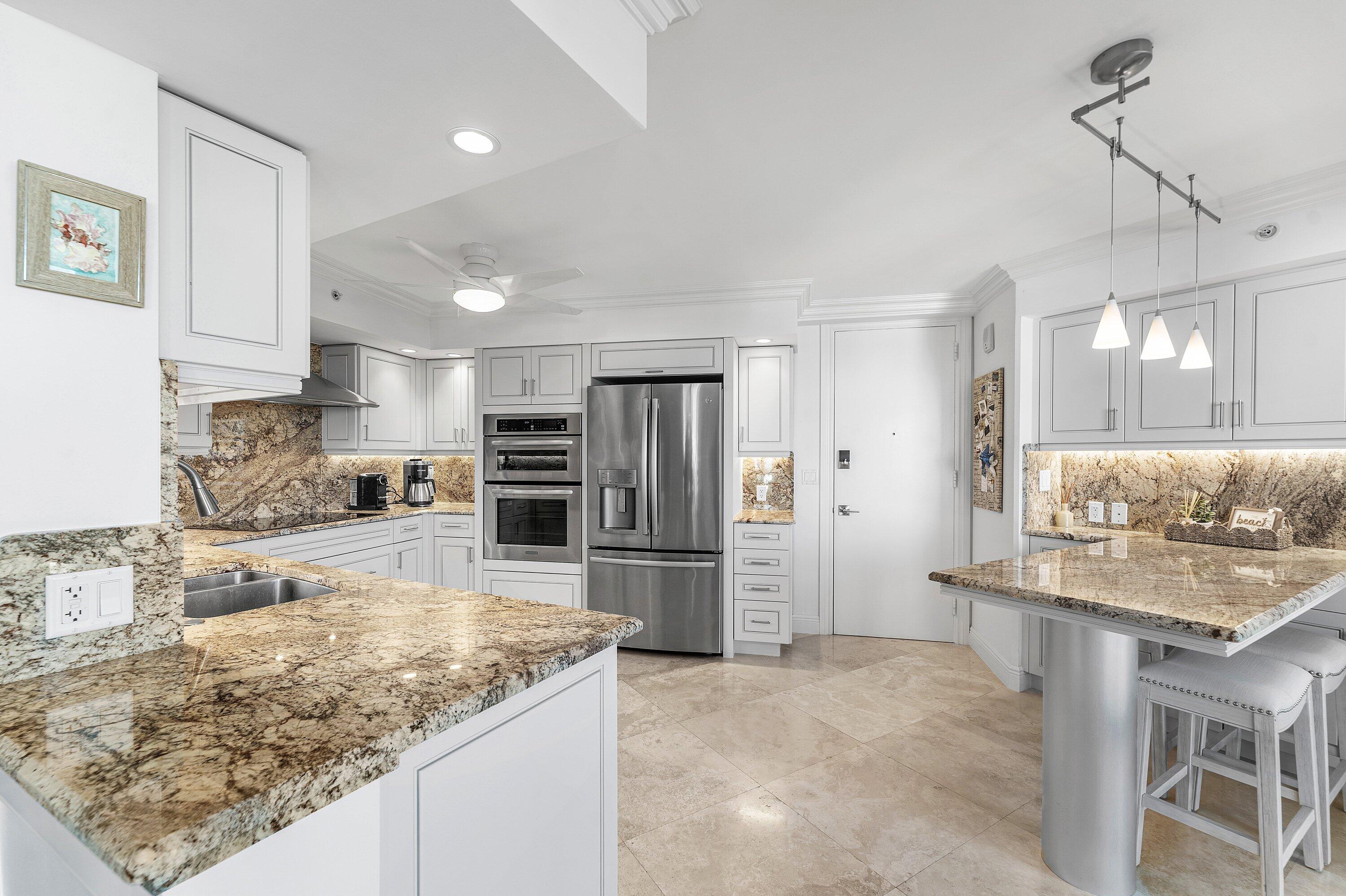 4545 North Ocean Boulevard, Unit PHD Boca Raton, FL 33431 - Photo 14 of 35 Kitchen w expansive counter & cabinets