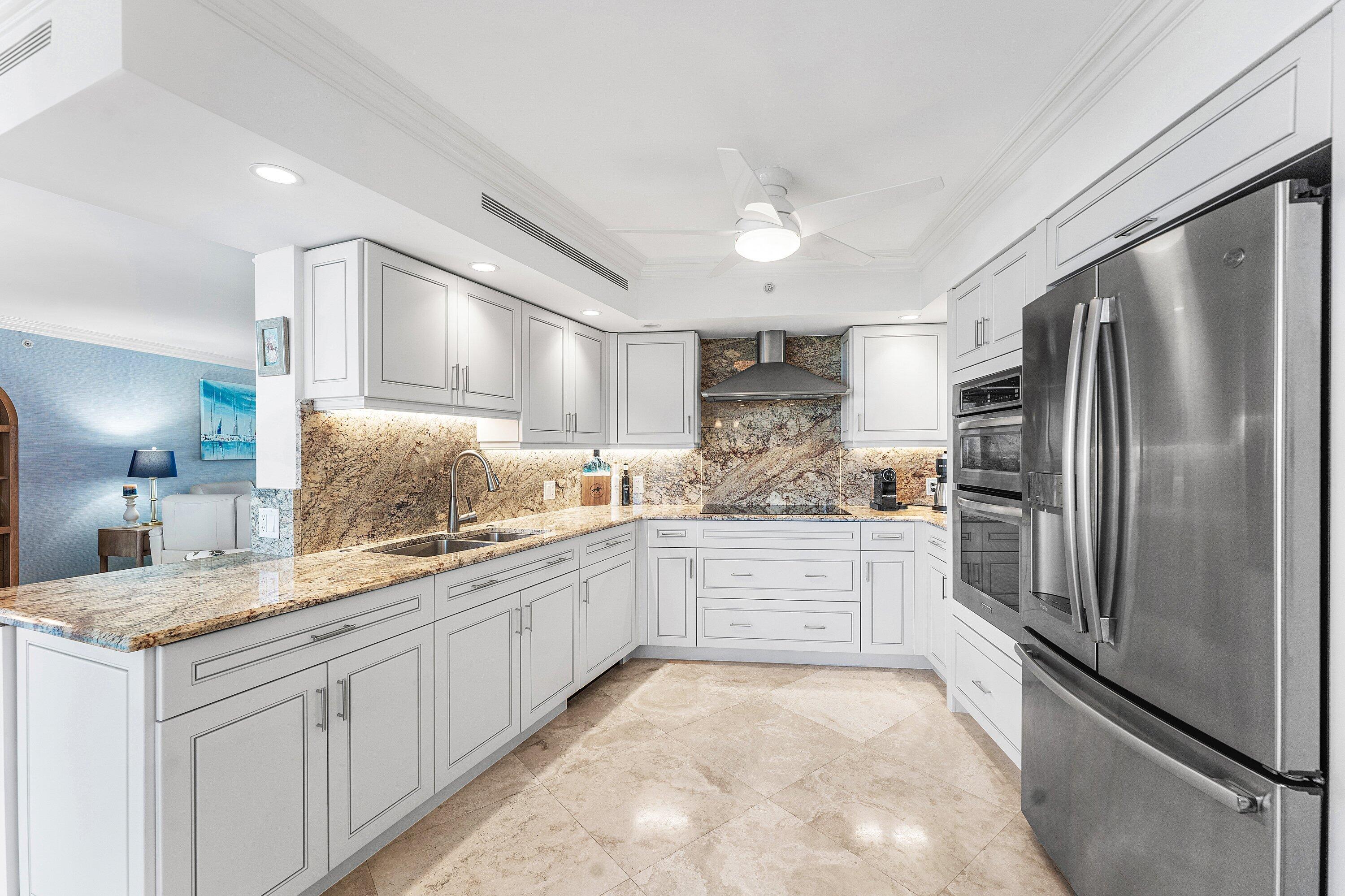 4545 North Ocean Boulevard, Unit PHD Boca Raton, FL 33431 - Photo 15 of 35 Kitchen w expansive counter & cabinets