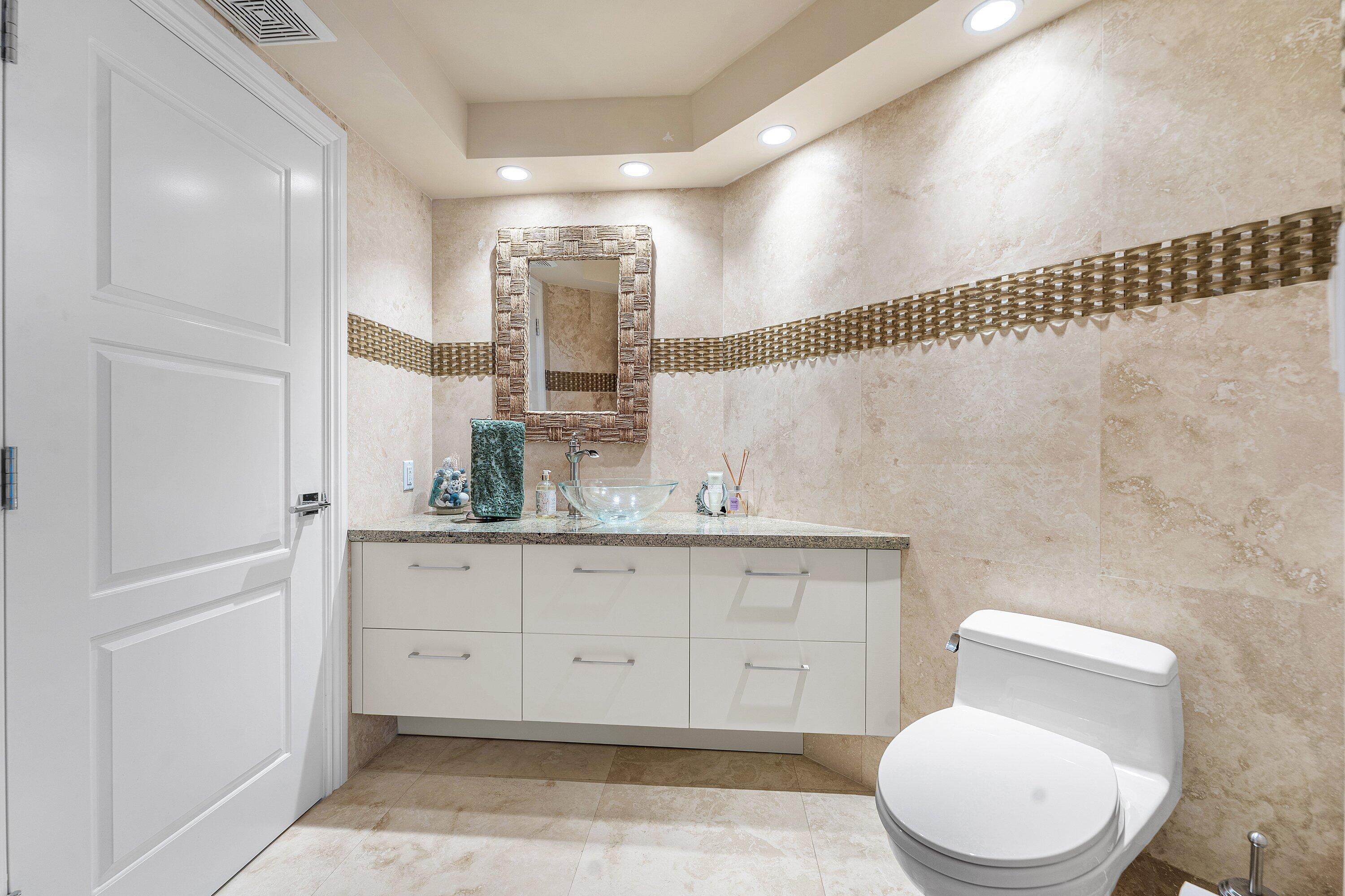 4545 North Ocean Boulevard, Unit PHD Boca Raton, FL 33431 - Photo 17 of 35 Guest half bathroom