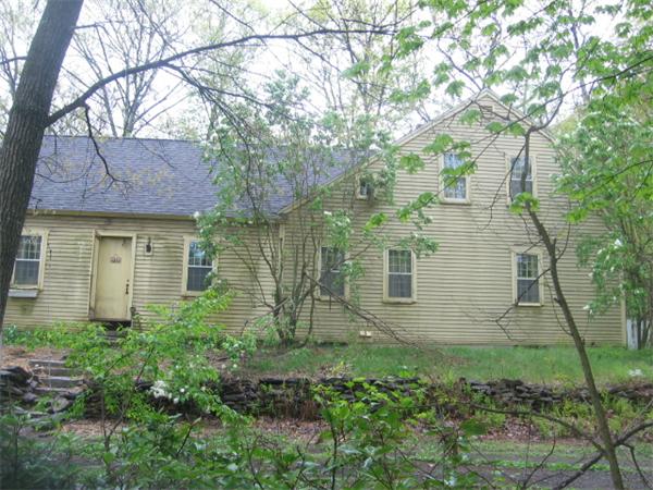 26 Adams Road Boxford, MA 01921 - Photo 2 of 6 a view of a brick house next to a large tree