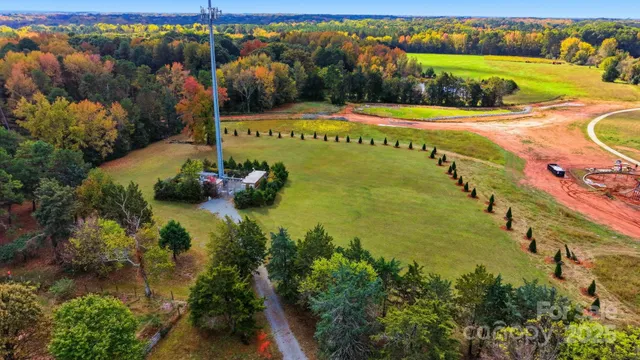 a view of a lake with a yard