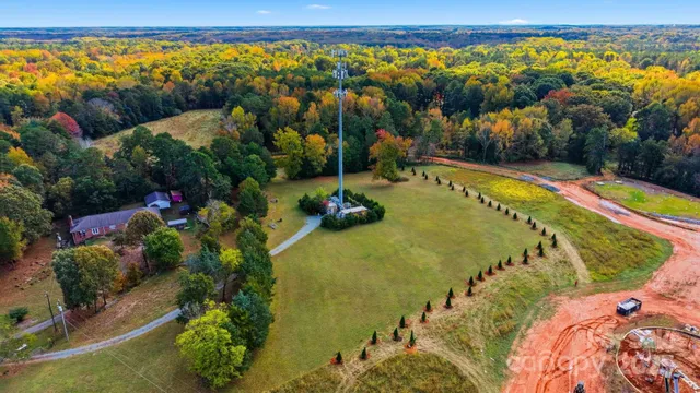 a view of a swimming pool and an outdoor seating