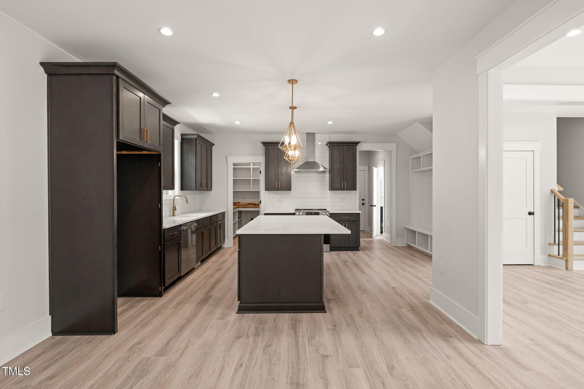 380 Pilot Ridge Road Zebulon, NC 27597 - Photo 12 of 42 a kitchen with a refrigerator and a sink