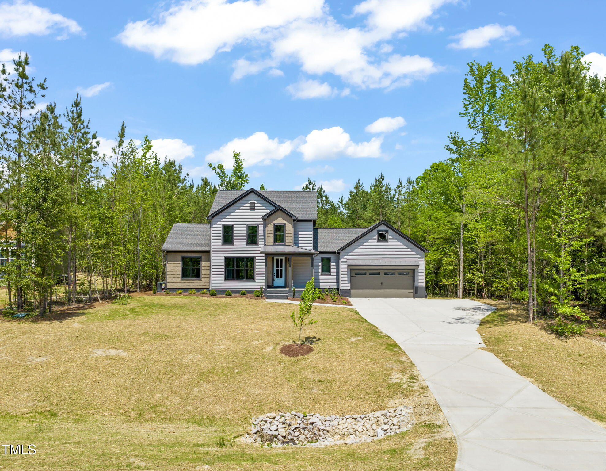 380 Pilot Ridge Road Zebulon, NC 27597 - Photo 41 of 42 a front view of a house with a yard