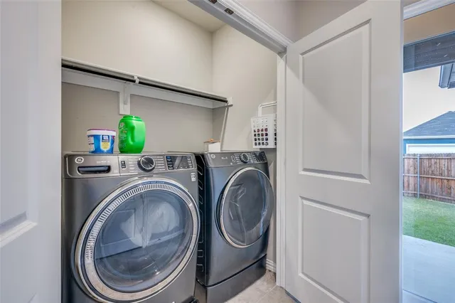 a utility room with dryer and washer