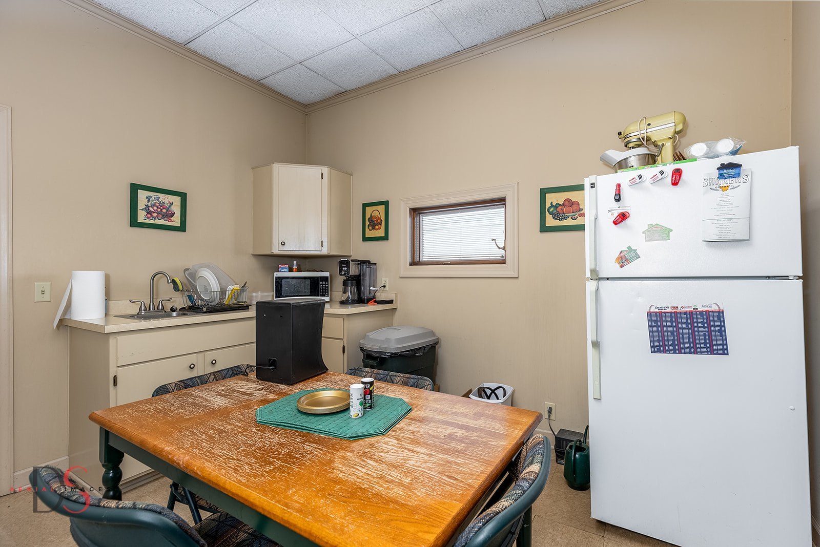 410 North 3059th Road Ottawa, IL 61350 - Photo 12 of 12 a kitchen with a refrigerator and stove