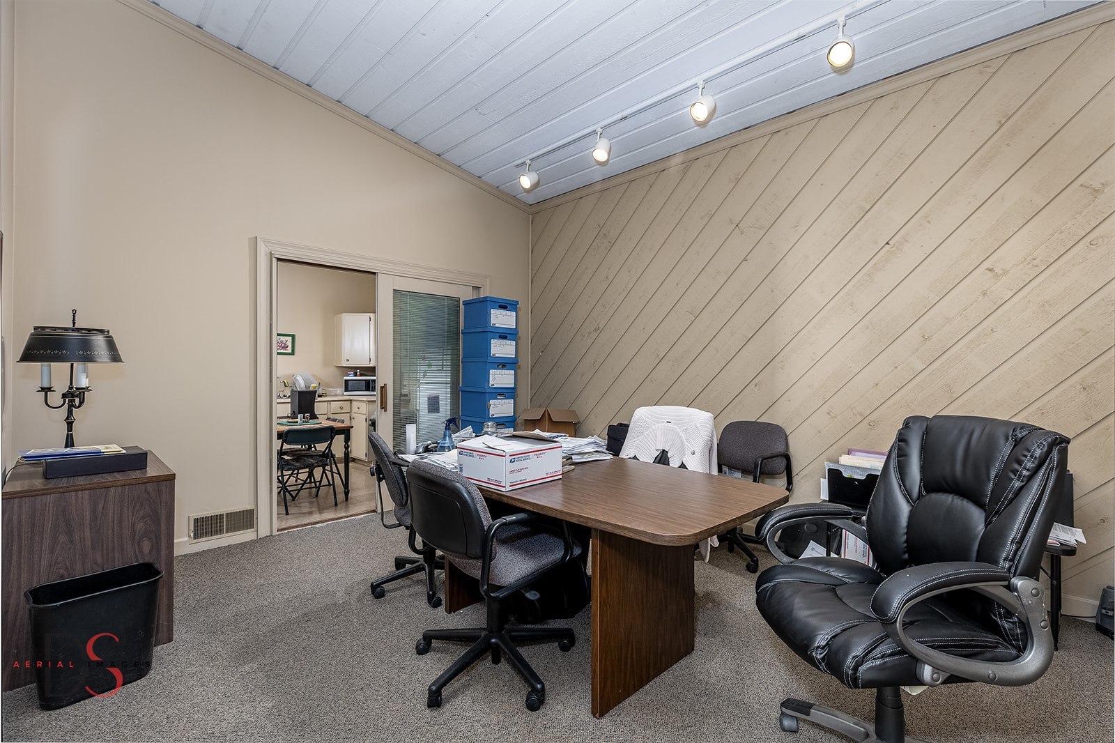 410 North 3059th Road Ottawa, IL 61350 - Photo 9 of 12 a work room with furniture and a rug
