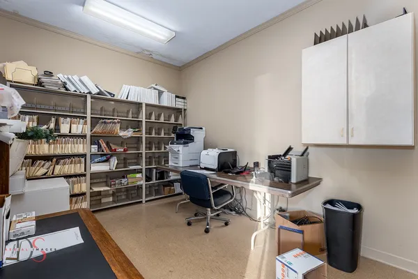 a view of a workspace with furniture
