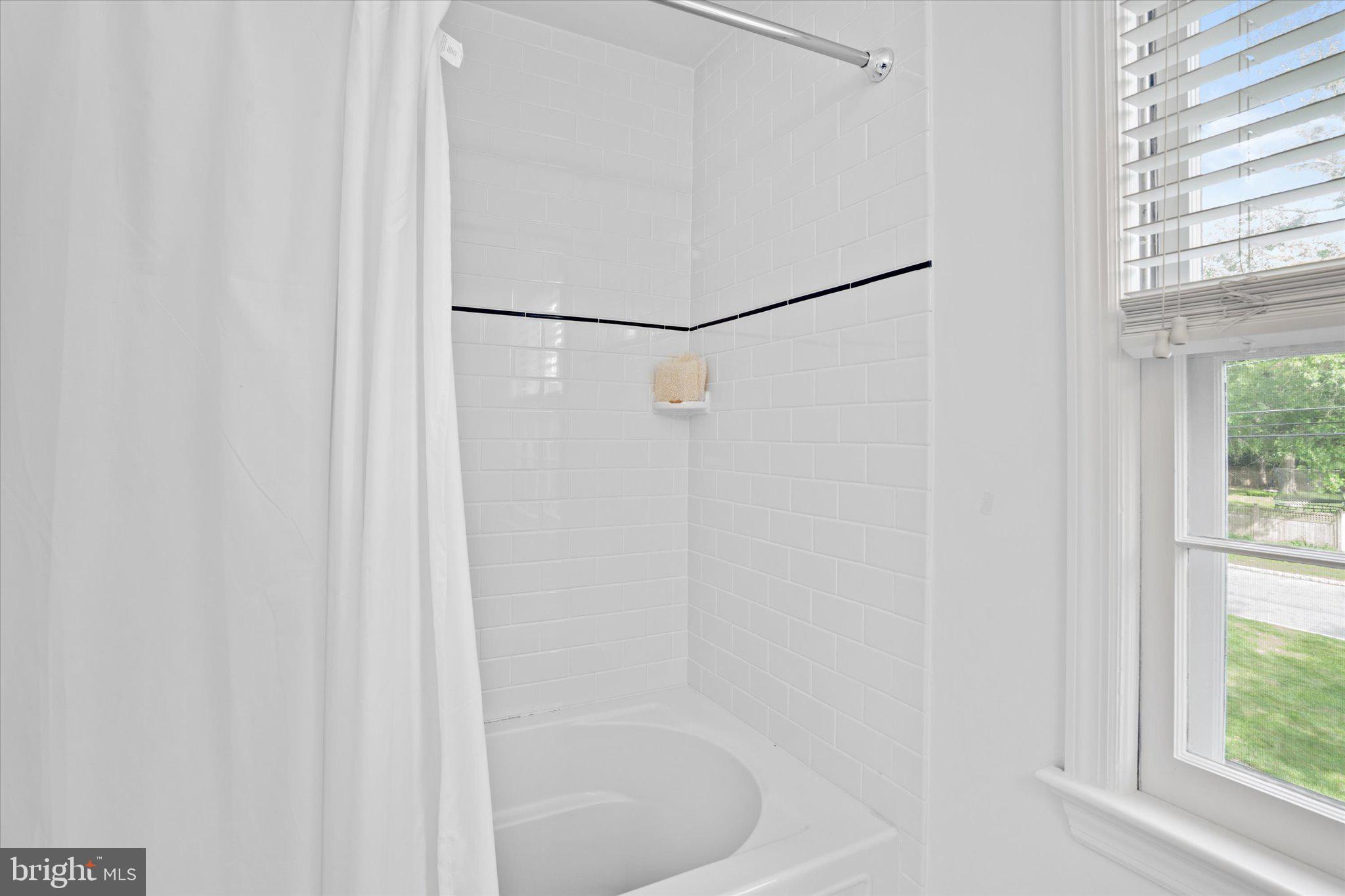 127 Westerly Road Princeton, NJ 08540 - Photo 24 of 30 a bathroom with a bathtub