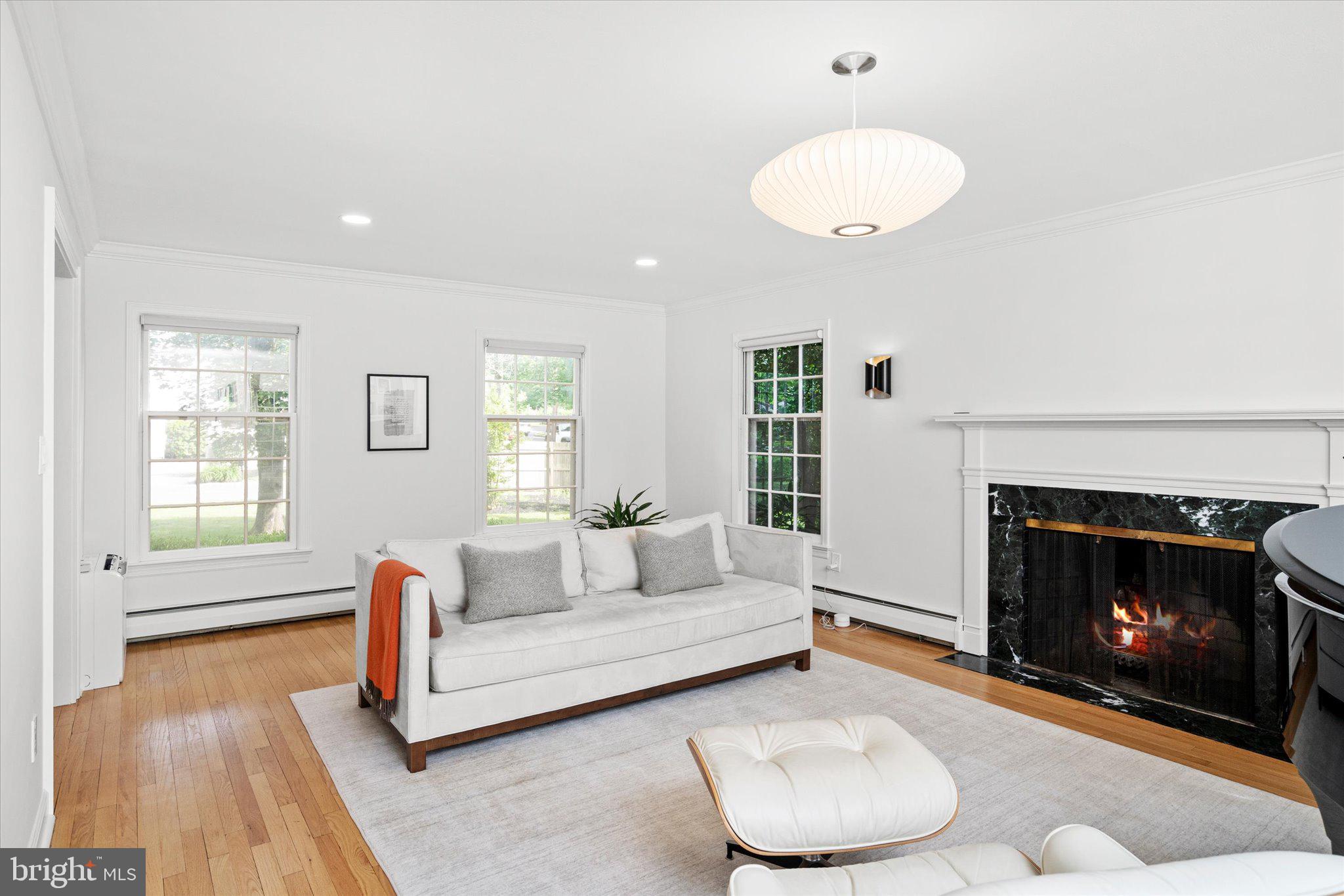 127 Westerly Road Princeton, NJ 08540 - Photo 7 of 30 a living room with furniture and a fireplace