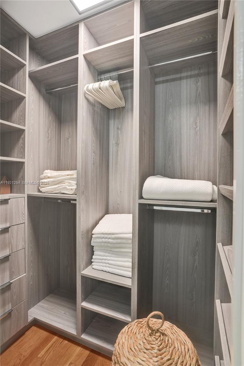 10400 Southwest 62nd Street Miami, FL 33173 - Photo 15 of 34 a room with a door and a wooden floor