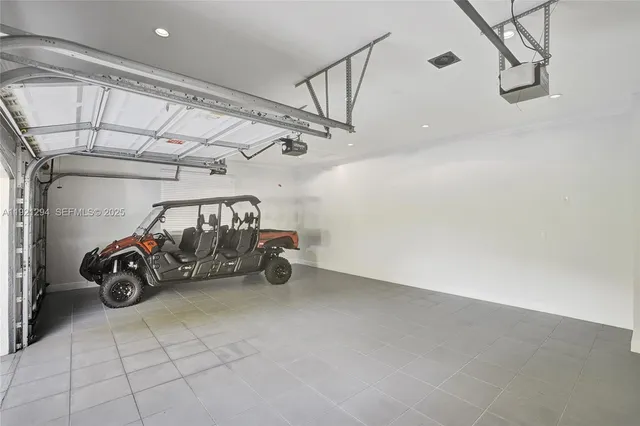 a view of a garage with a bike and a window