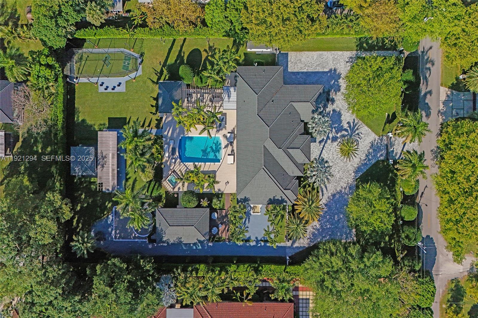 10400 Southwest 62nd Street Miami, FL 33173 - Photo 2 of 34 an aerial view of a house with a garden