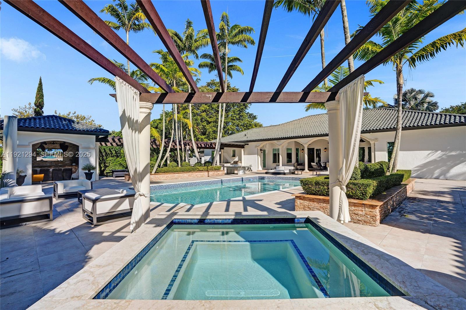 10400 Southwest 62nd Street Miami, FL 33173 - Photo 21 of 34 a view of house with swimming pool outdoor seating