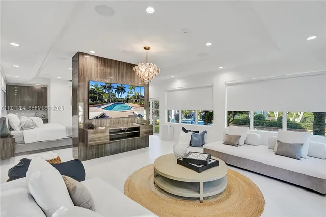 a bedroom with a large bed and a couch