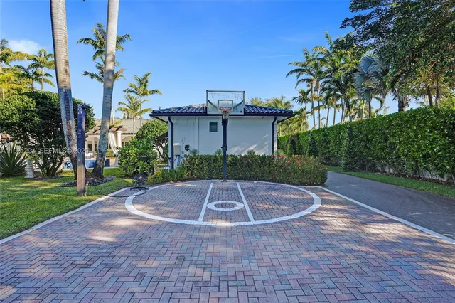 a living room with fireplace furniture and a flat screen tv