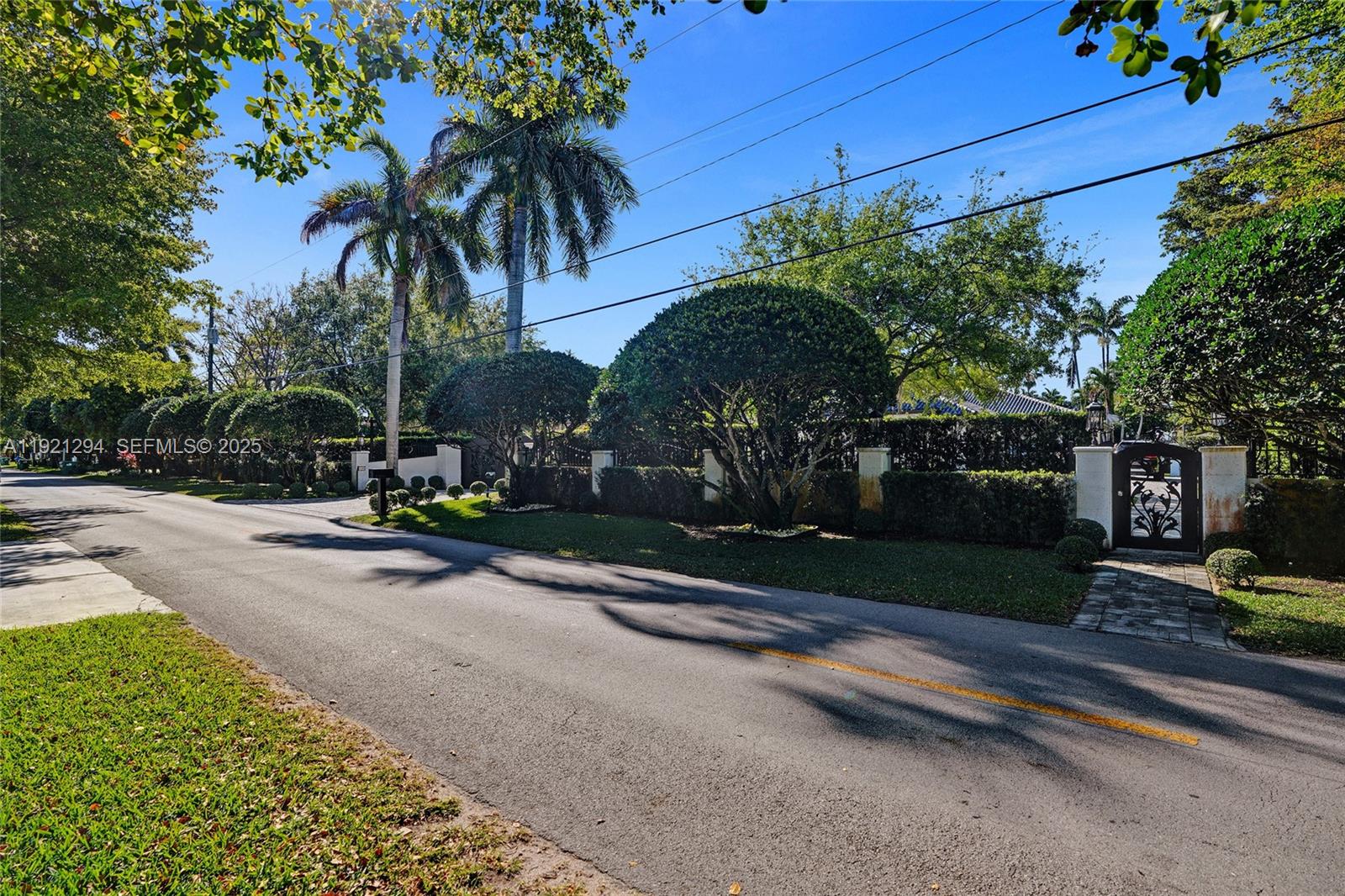 10400 Southwest 62nd Street Miami, FL 33173 - Photo 3 of 34 a view of a street with a building and a street sign