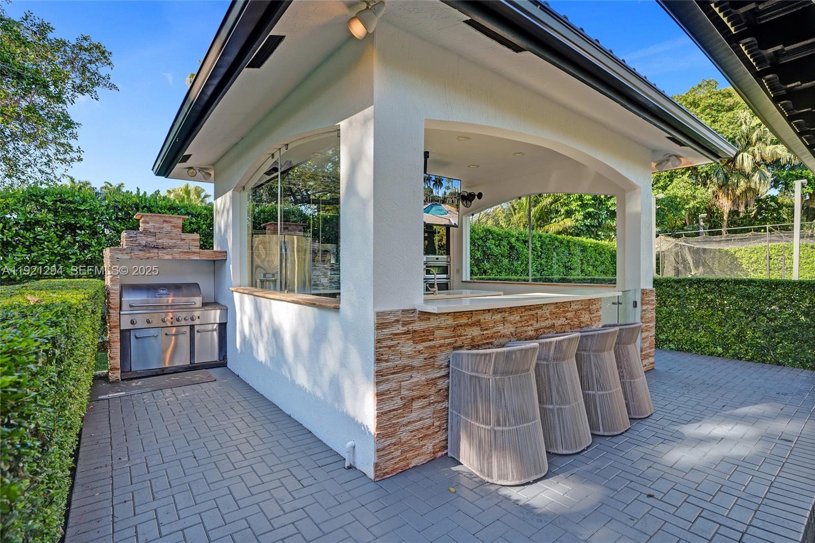 10400 Southwest 62nd Street Miami, FL 33173 - Photo 33 of 34 a view of backyard with a deck and garden