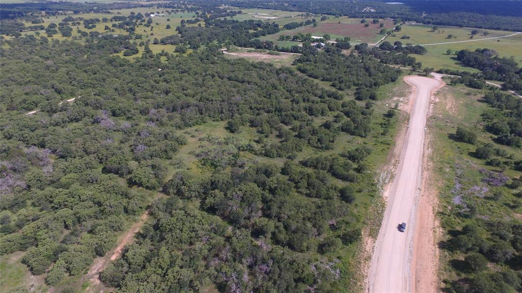 Lot 89 Paradise Oaks Perrin, TX 76486 - Photo 10 of 11 an aerial view of a house with a yard