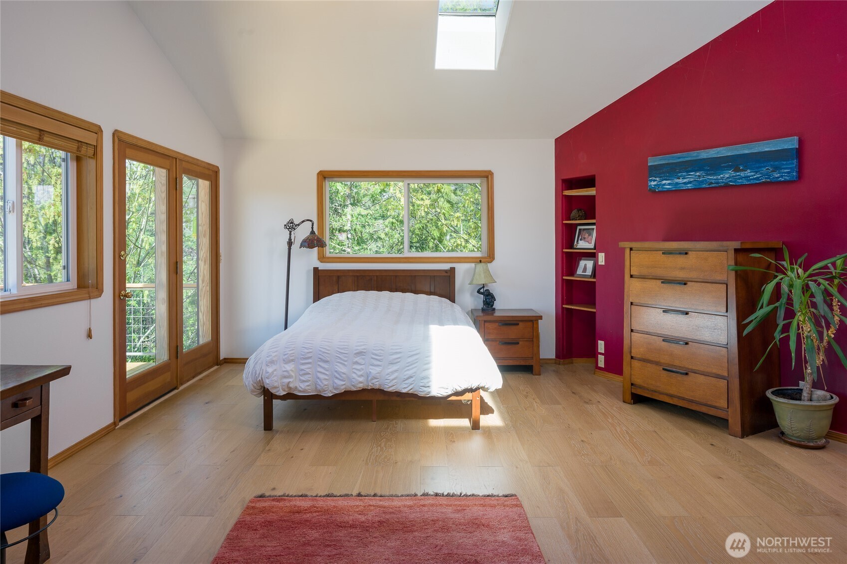 486 Wildwood Road Orcas Island, WA 98245 - Photo 15 of 37 a bed sitting in a room next to a window