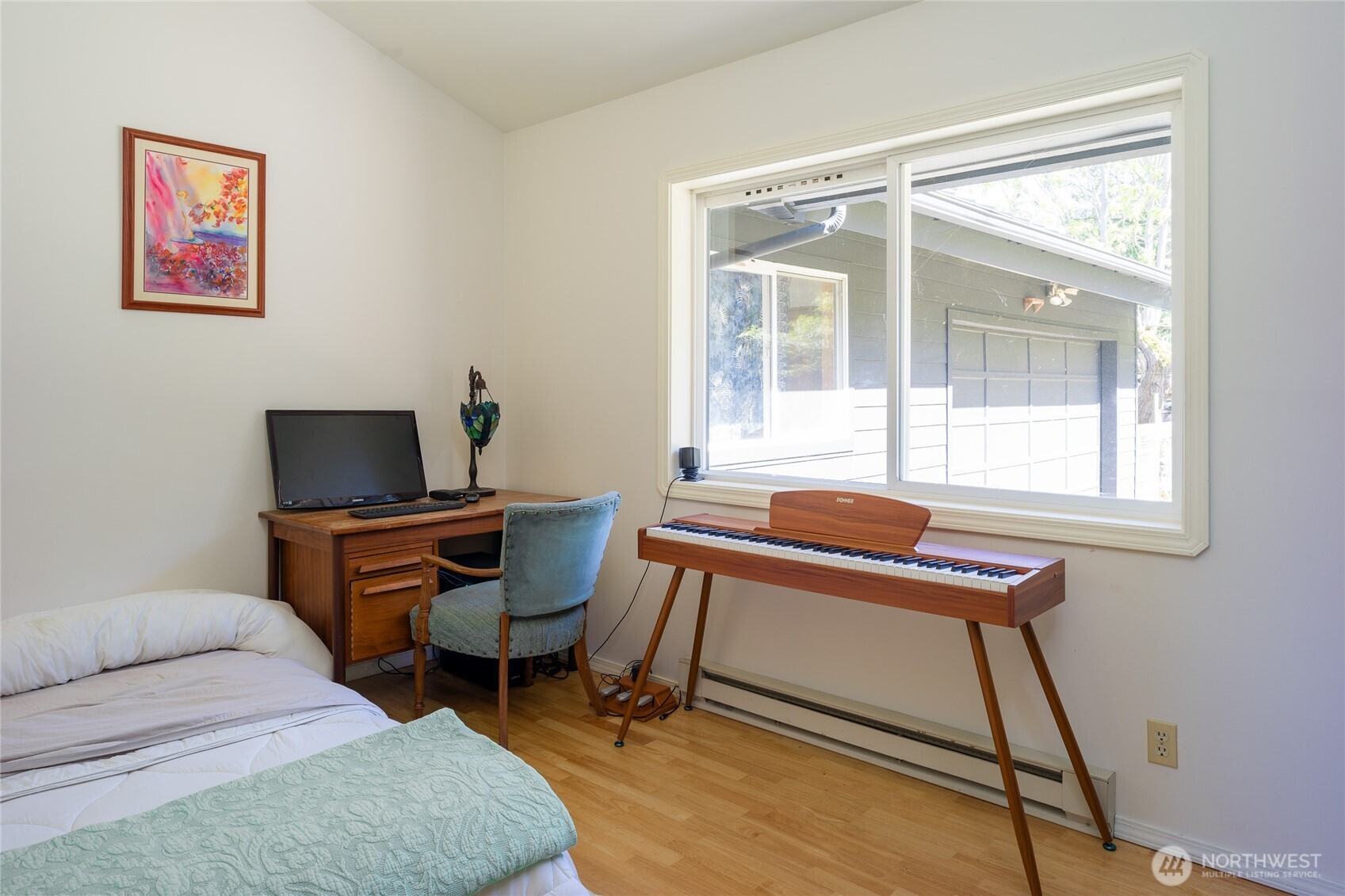 486 Wildwood Road Orcas Island, WA 98245 - Photo 18 of 37 a living room with a couch and a window