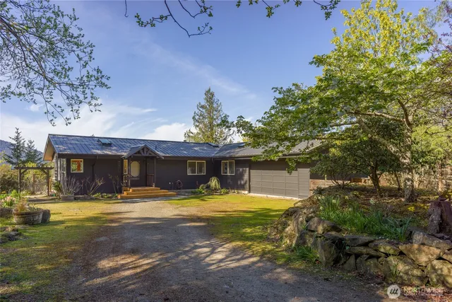 a view of a house with swimming pool