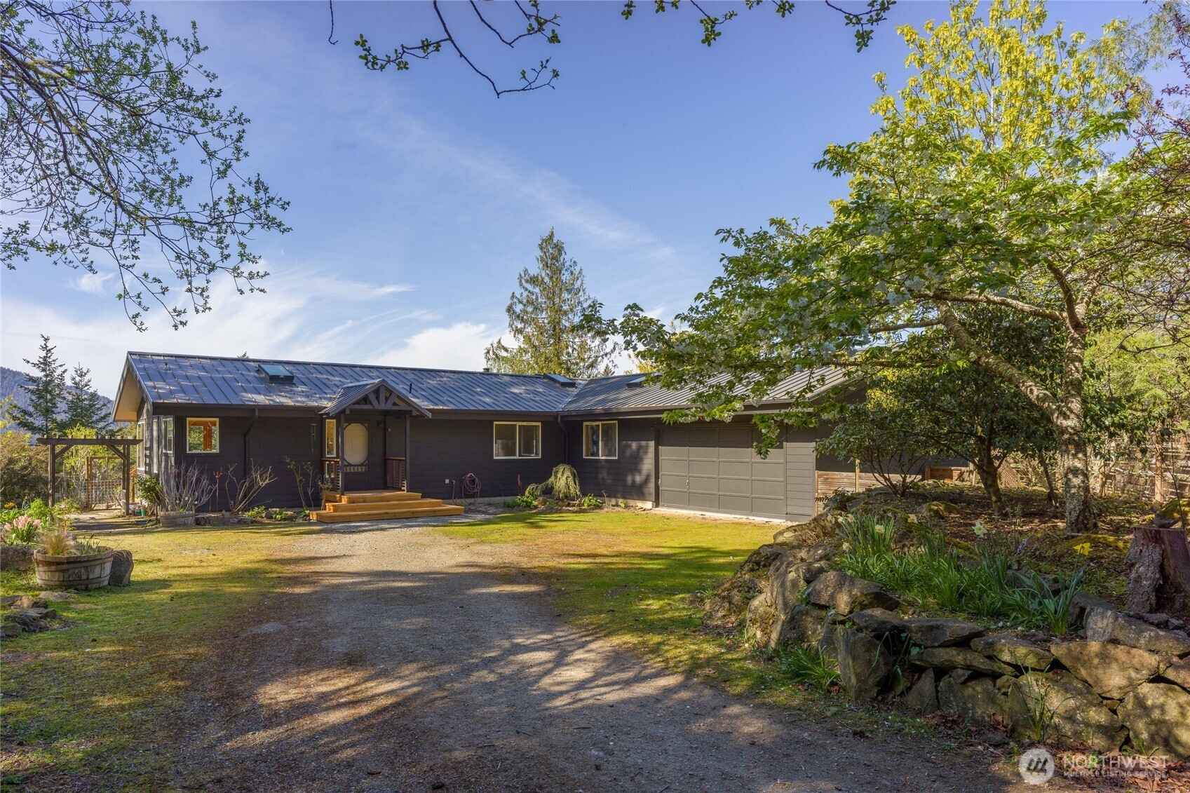 486 Wildwood Road Orcas Island, WA 98245 - Photo 25 of 37 a view of a house with swimming pool