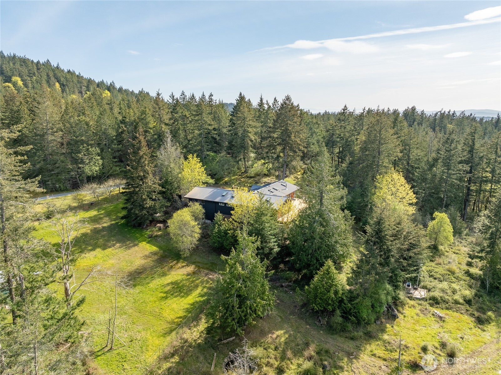 486 Wildwood Road Orcas Island, WA 98245 - Photo 28 of 37 a view of a pond with lots of trees