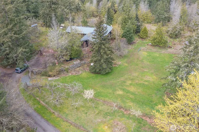 a bathroom with a tub and shower
