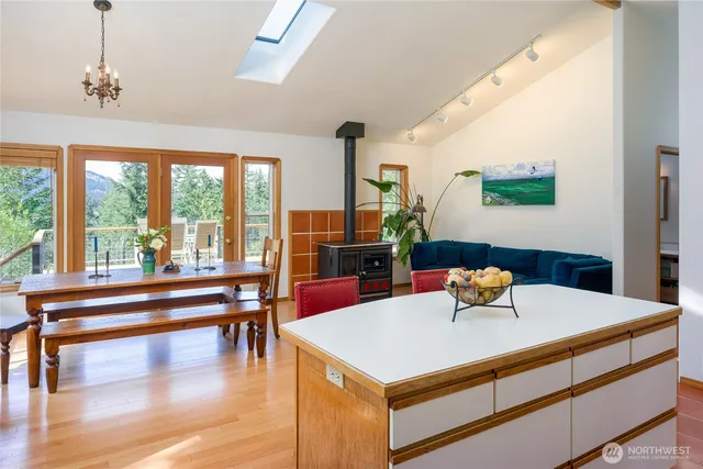 a dining room with a table and chairs