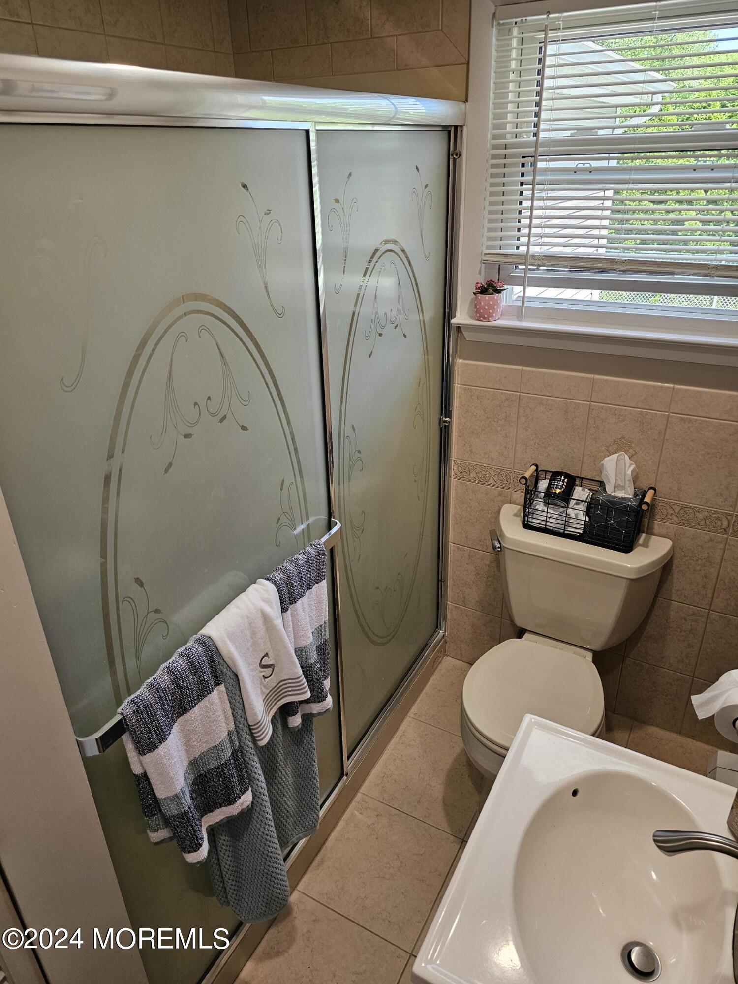 42 Middlesex Road Matawan, NJ 07747 - Photo 20 of 33 a bathroom with a toilet and a sink