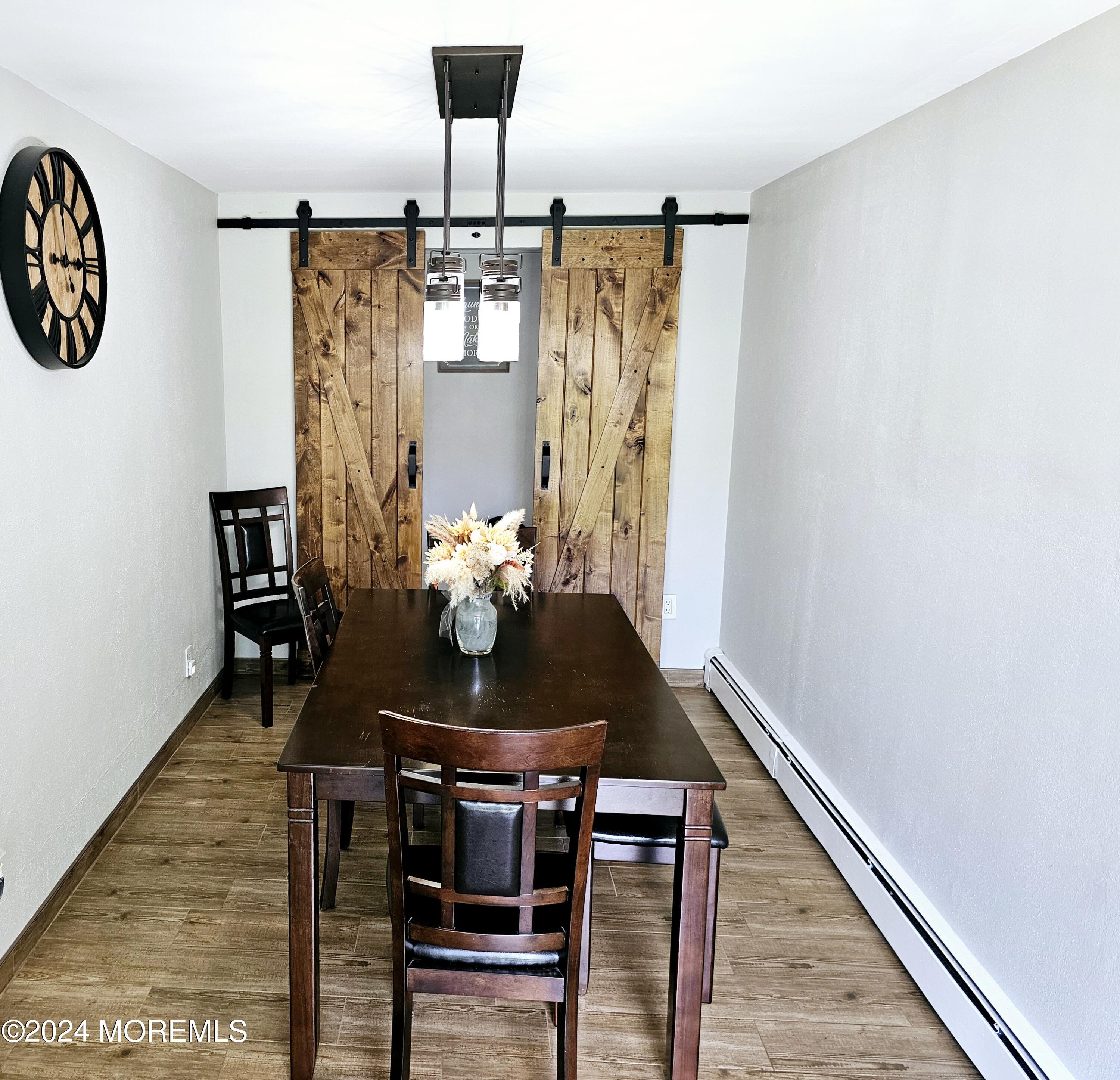 42 Middlesex Road Matawan, NJ 07747 - Photo 22 of 33 a dining room with furniture and wooden floor