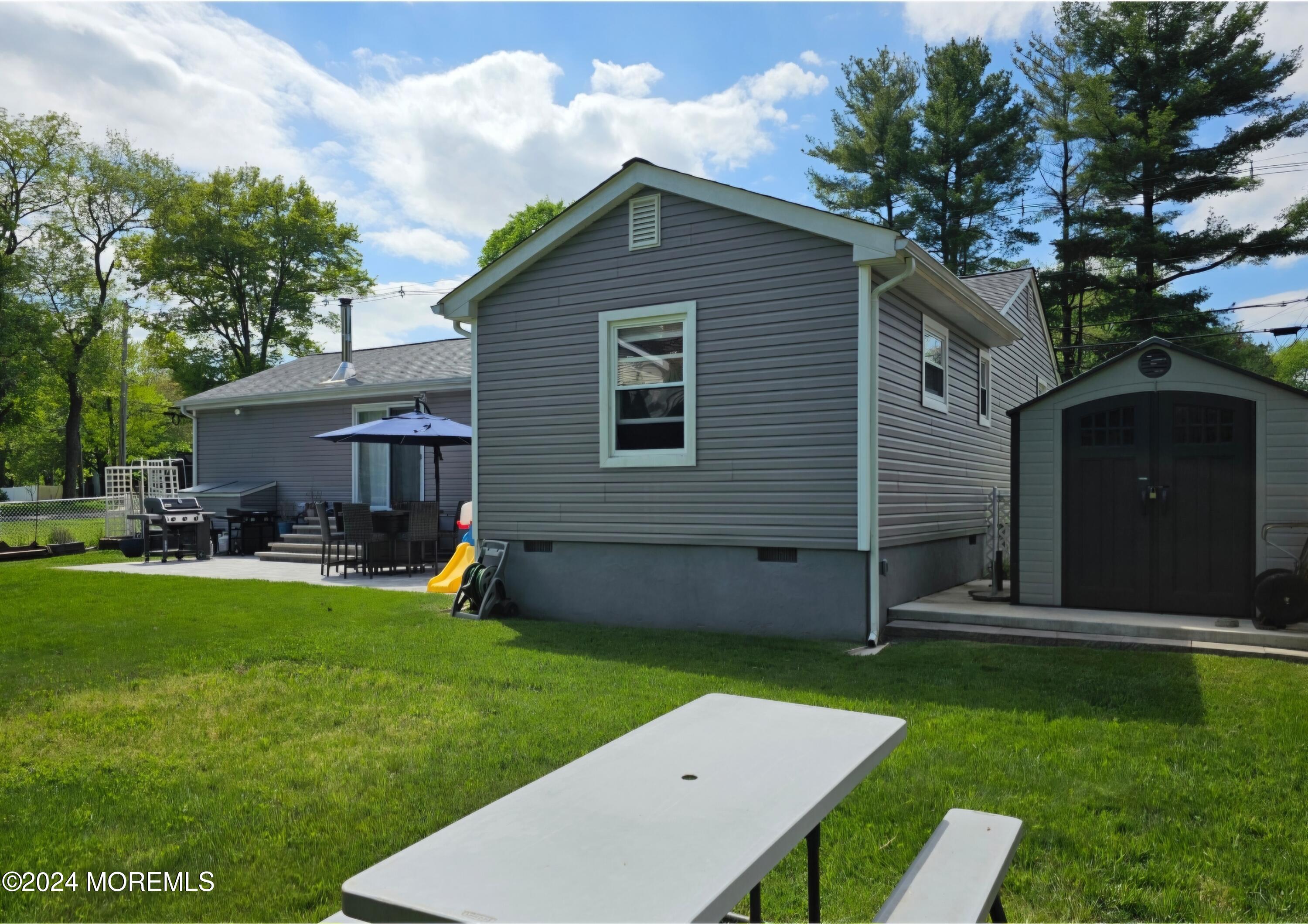 42 Middlesex Road Matawan, NJ 07747 - Photo 28 of 33 a front view of house with yard