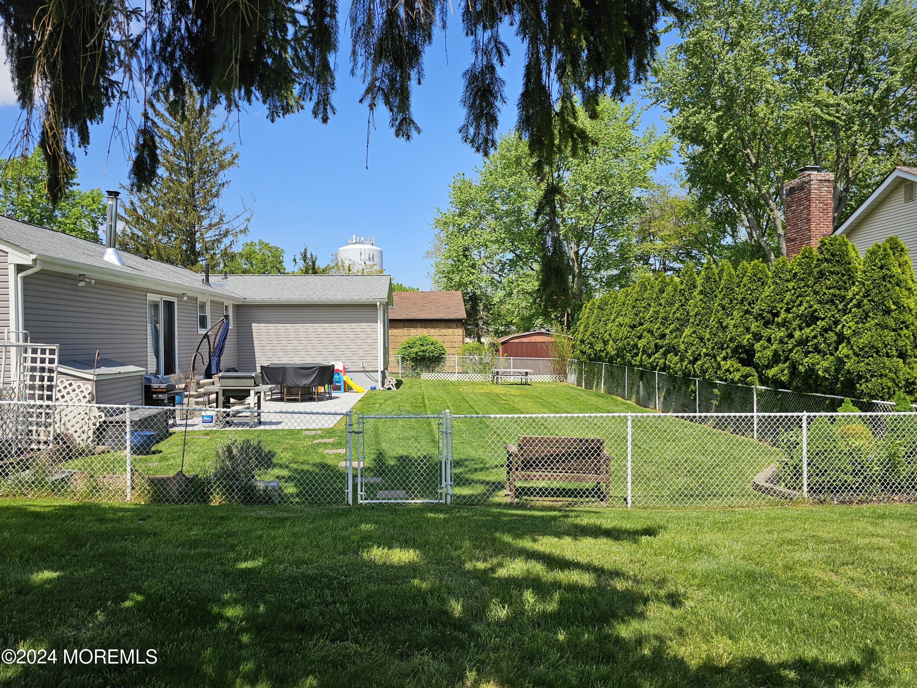 42 Middlesex Road Matawan, NJ 07747 - Photo 30 of 33 a view of a house with a backyard