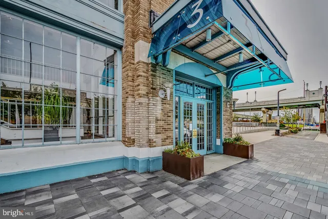 a view of a building with sitting area