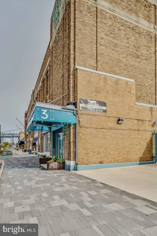 a view of staircase with a couch