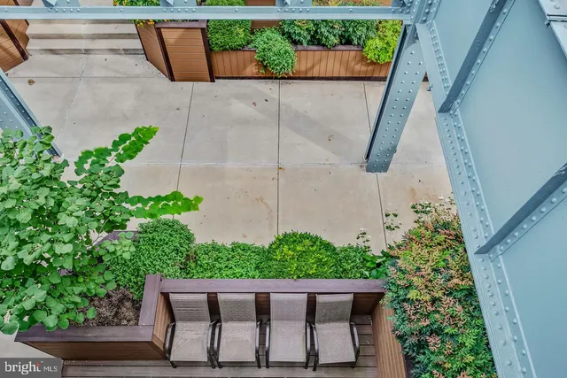 a view of a house with a tree