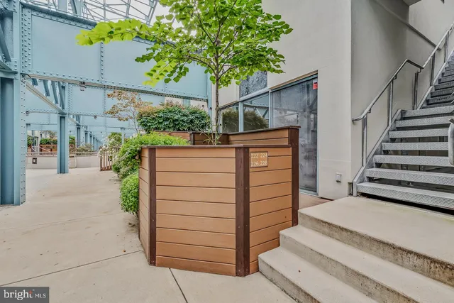 a front view of a building with garden