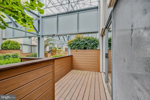 a view of a house with porch and wooden floor