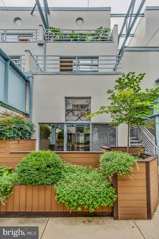 a view of a house with a street