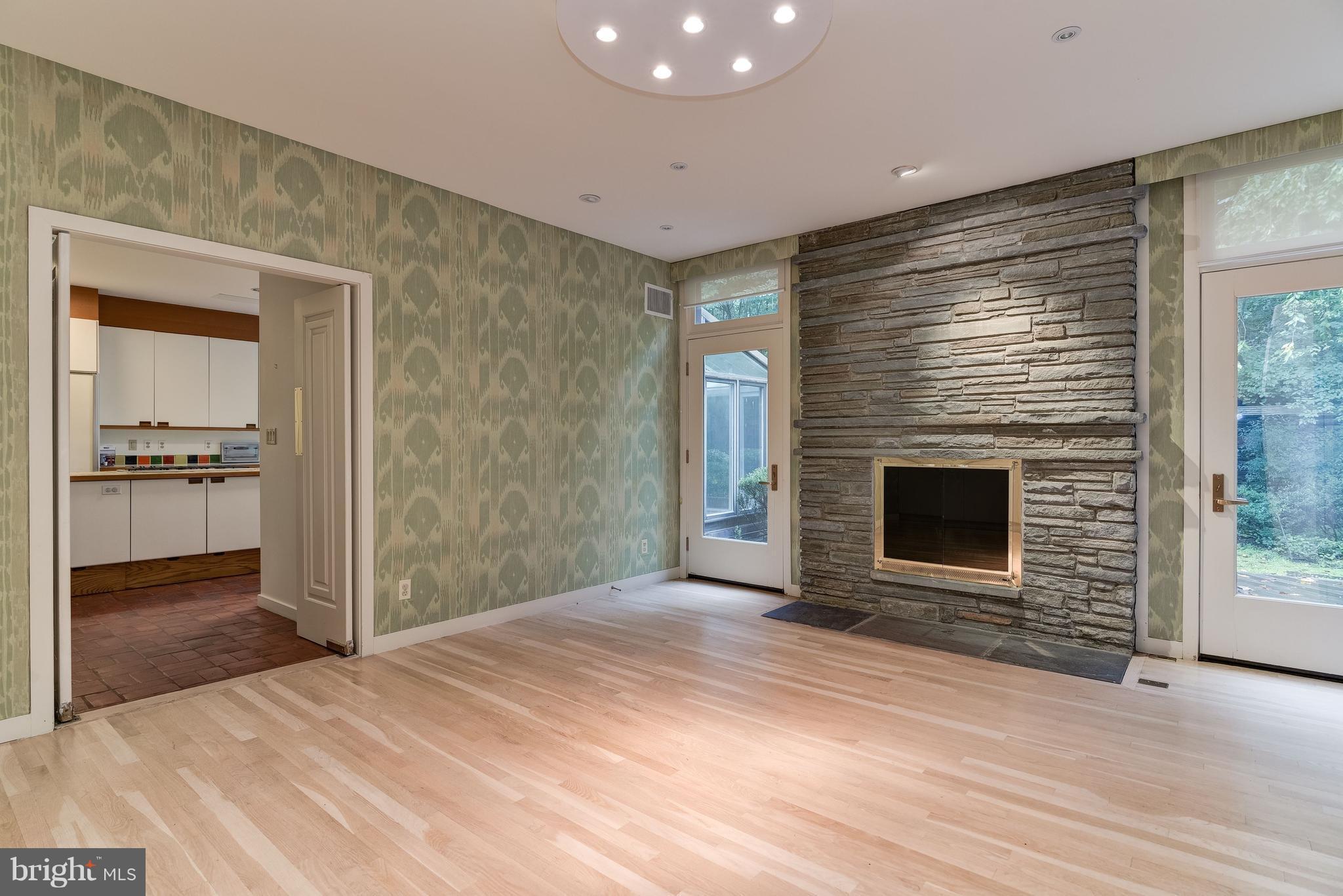8925 Burning Tree Road Bethesda, MD 20817 - Photo 15 of 22 Dining Room with Wood Burning Fireplace