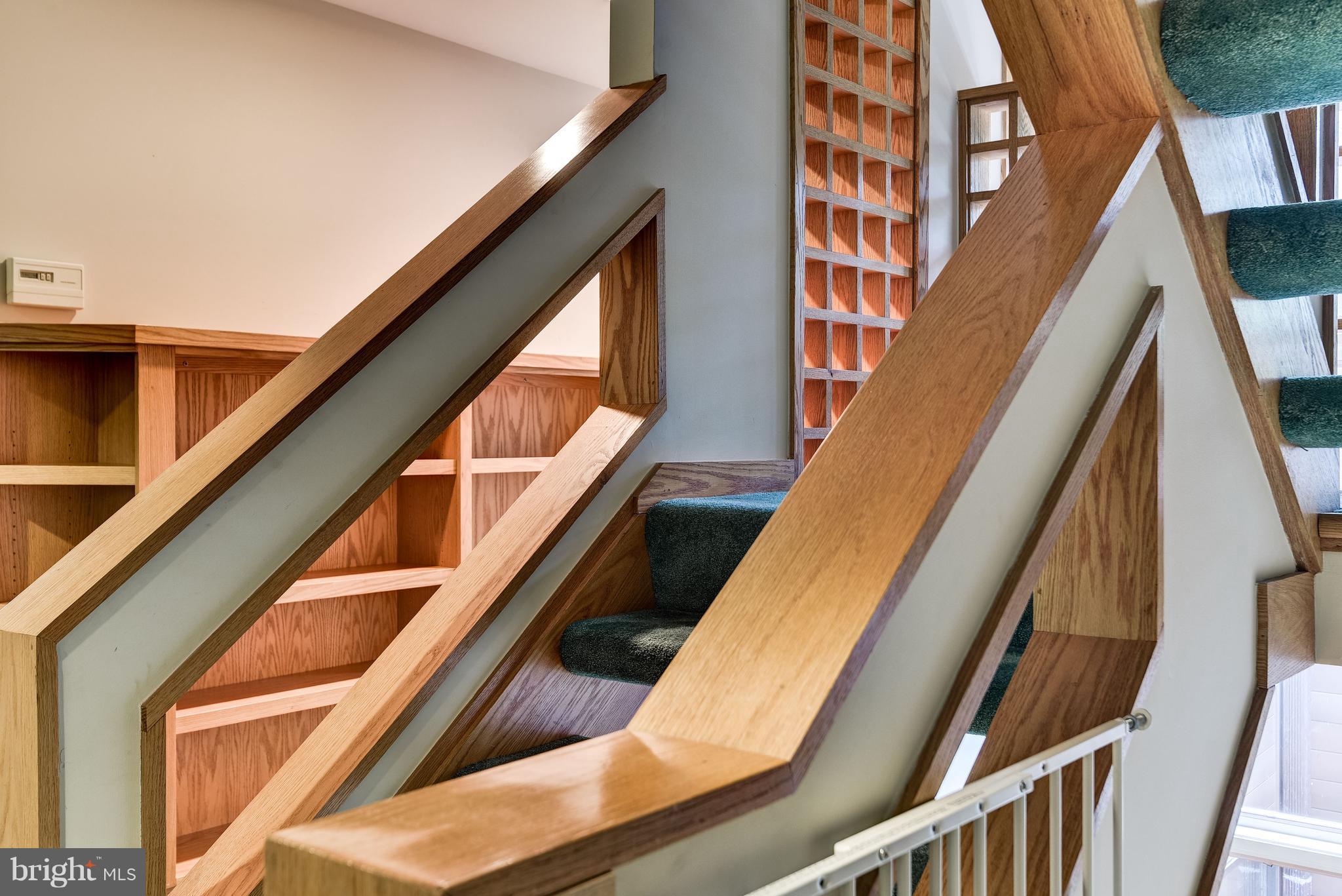 8925 Burning Tree Road Bethesda, MD 20817 - Photo 19 of 22 Staircase leading to Storage and Cedar Closet