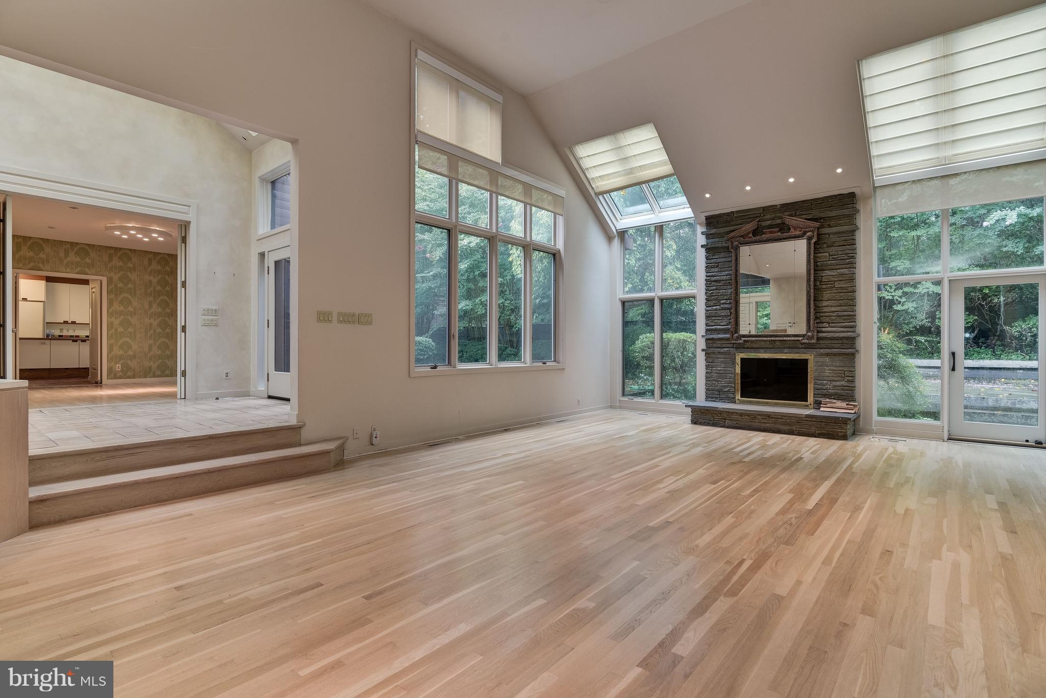 8925 Burning Tree Road Bethesda, MD 20817 - Photo 8 of 22 Living Room with Wood Burning Fireplace