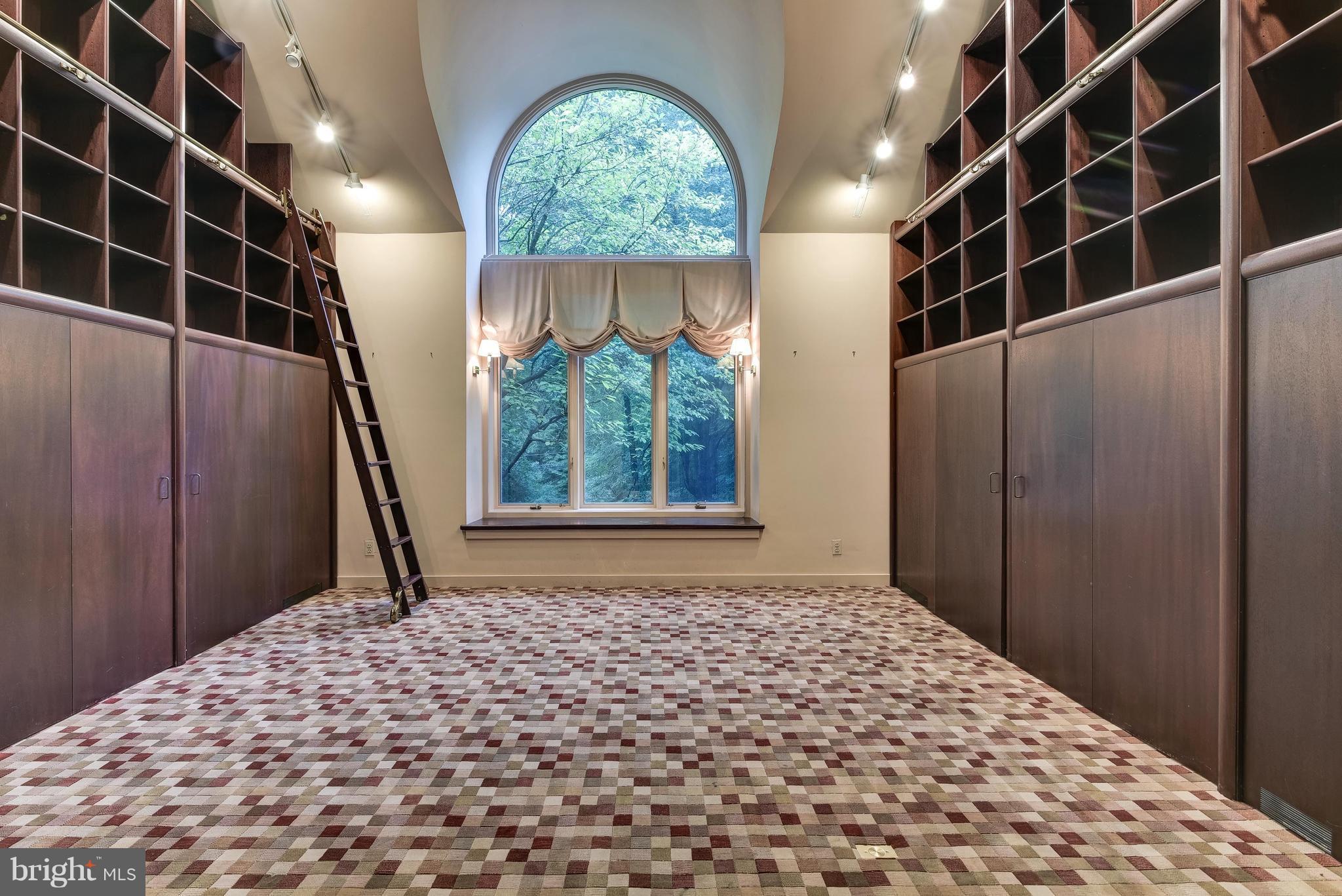 8925 Burning Tree Road Bethesda, MD 20817 - Photo 10 of 22 Library with built-in bookshelves and desks