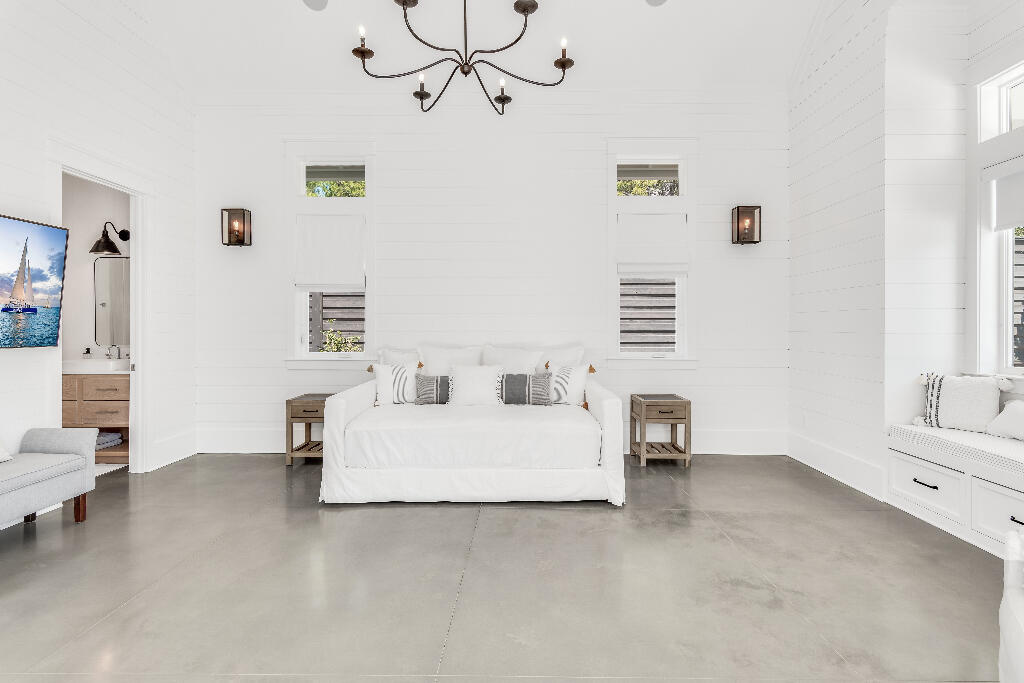 90 Sandstone Street Santa Rosa Beach, FL 32459 - Photo 16 of 73 a living room with furniture and a table