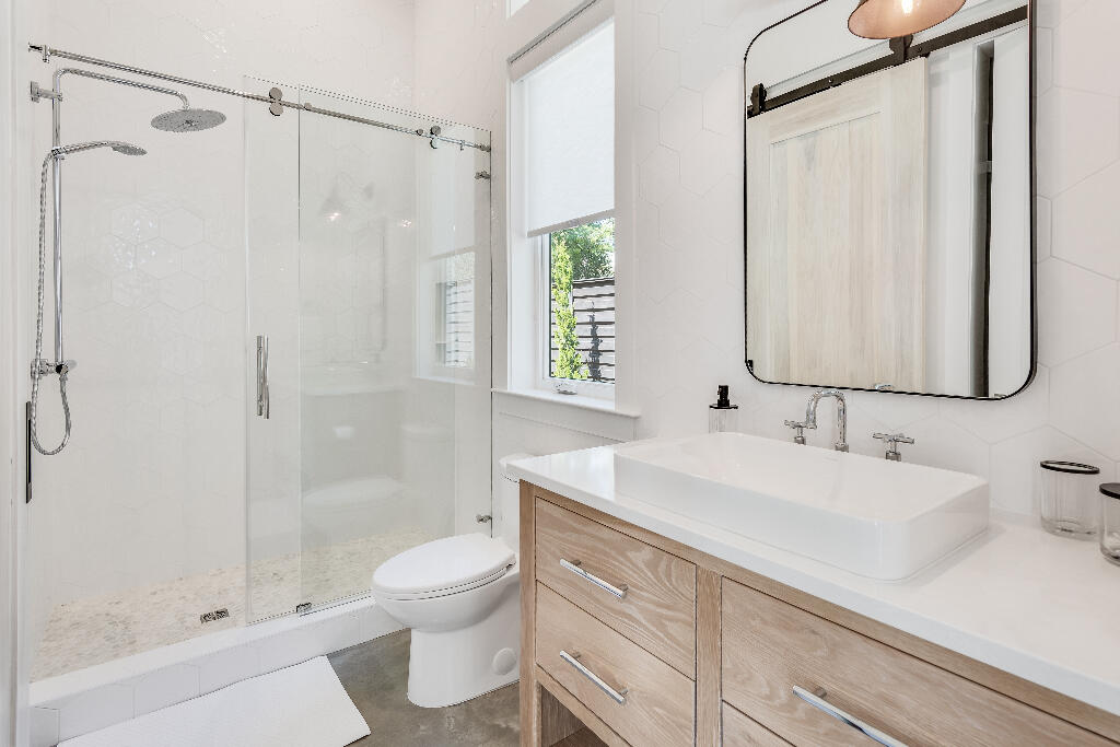 90 Sandstone Street Santa Rosa Beach, FL 32459 - Photo 20 of 73 a bathroom with a sink a toilet and shower