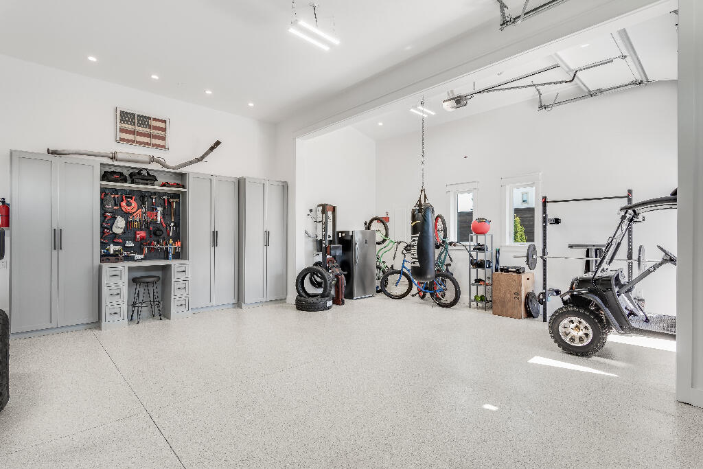 90 Sandstone Street Santa Rosa Beach, FL 32459 - Photo 23 of 73 a view of a garage with a bike and white car